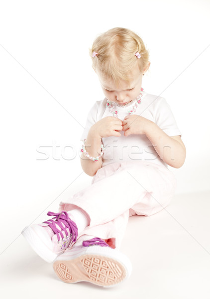 Oturma küçük kız kolye kız moda Stok fotoğraf © phbcz
