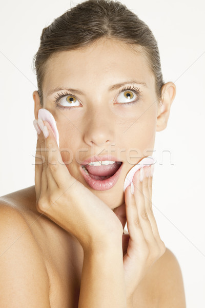 Stock photo: portrait of young woman with cotton pads