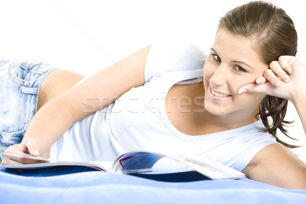 portrait of lying down woman with a journal Stock photo © phbcz