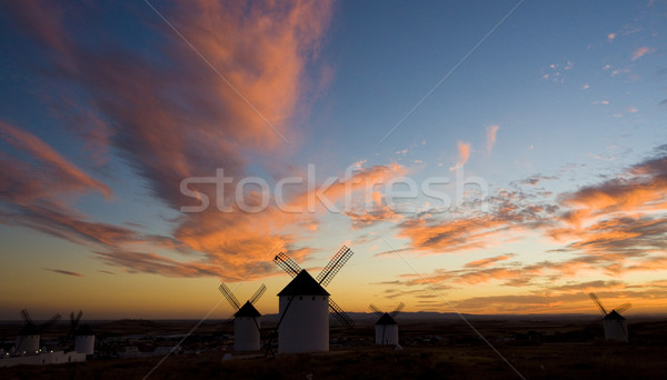 windmills at sunset, Campo de Criptana, Castile-La Mancha, Spain Stock photo © phbcz