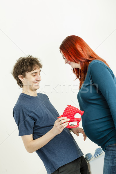 portrait of pregnant woman and her husband with a toy for a baby Stock photo © phbcz