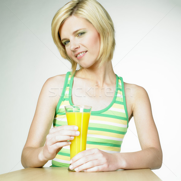 woman with a glass of juice Stock photo © phbcz