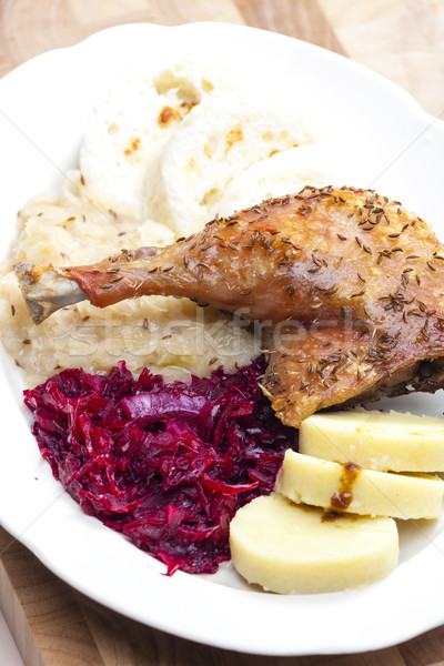 baked duck meat with dumlings and cabbage Stock photo © phbcz