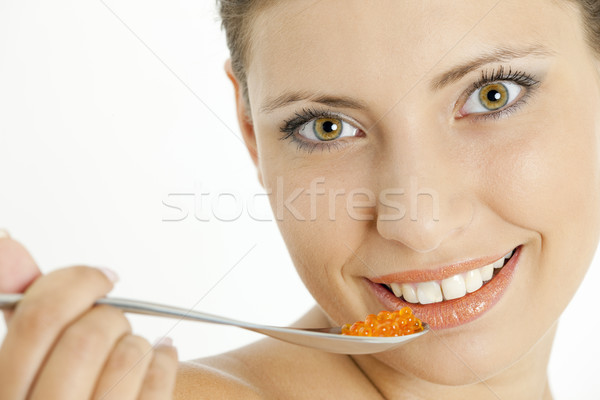 Stock photo: portrait of woman with red caviar