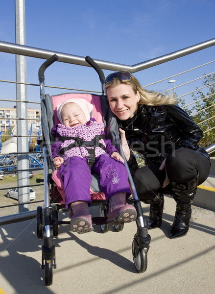 woman with toddler sitting in pram Stock photo © phbcz