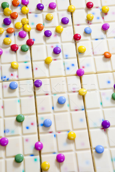 still life of white chocolate with smarties Stock photo © phbcz