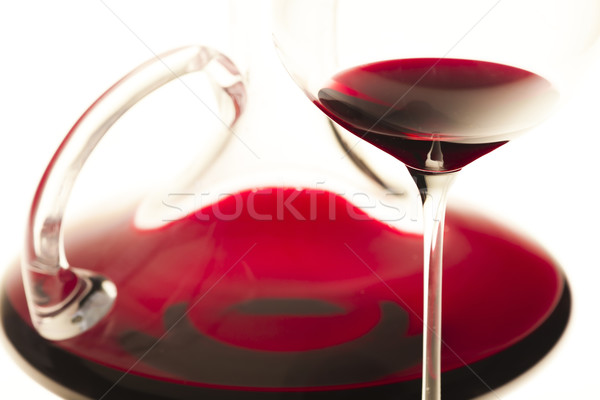 wine glass and carafe with red wine Stock photo © phbcz