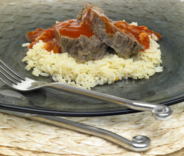 beef meat with tomato sauce Stock photo © phbcz