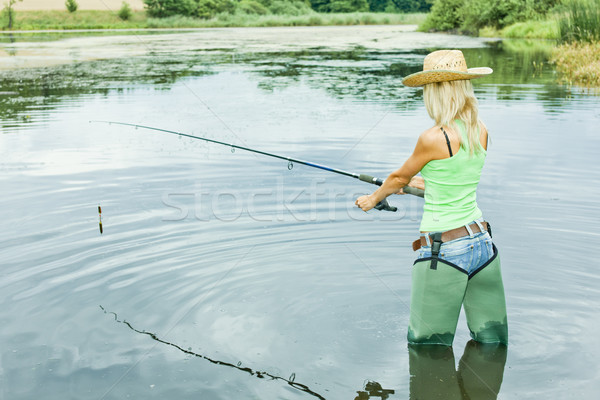 Zdjęcia stock: Kobieta · połowów · staw · sportu · kobiet · buty