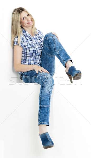 Stock photo: sitting woman wearing jeans and denim clogs