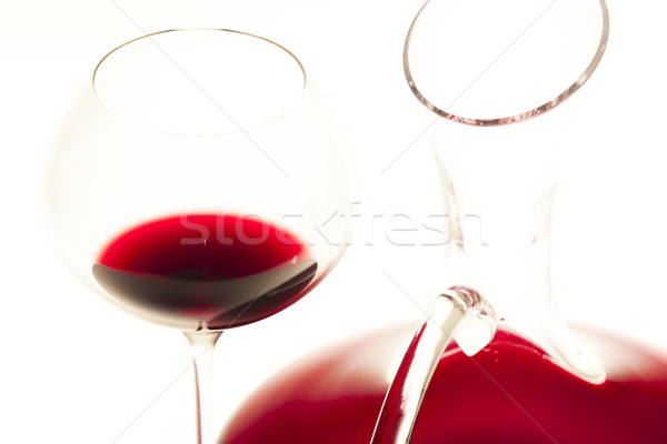 wine glass and carafe with red wine Stock photo © phbcz