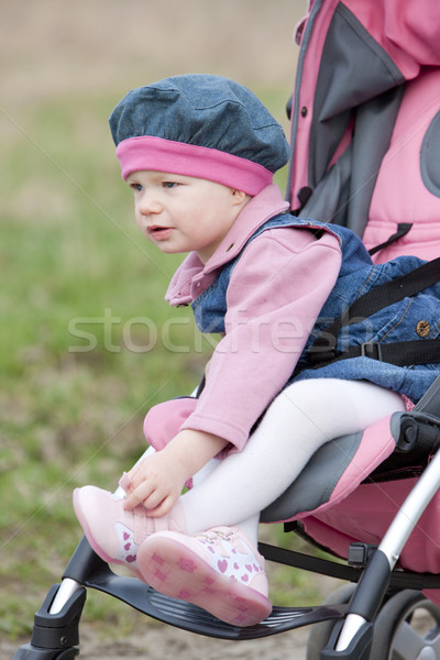 Kisgyerek ül babakocsi gyerekek gyermek lányok Stock fotó © phbcz