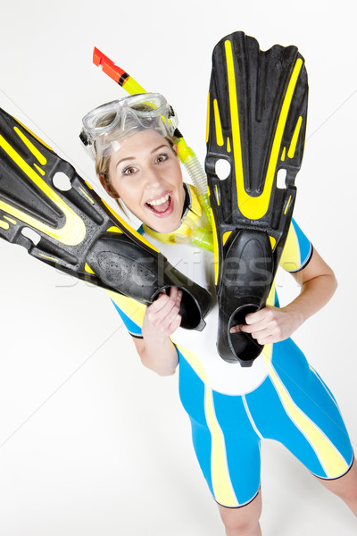 portrait of woman wearing neoprene with flippers and diving gogg Stock photo © phbcz