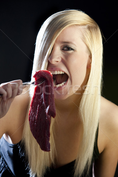 portrait of woman with raw meat Stock photo © phbcz