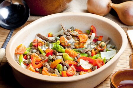beef meat with peppers, onion and capers Stock photo © phbcz