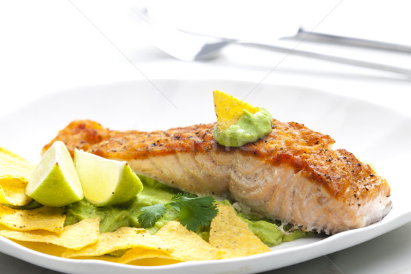 grilled salmon fillet with avocado sauce and nachos Stock photo © phbcz