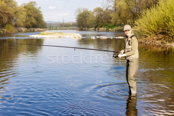 woman fishing in the river in spring Stock photo © phbcz