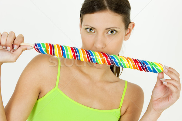 Stock photo: portrait of woman with a lollypop