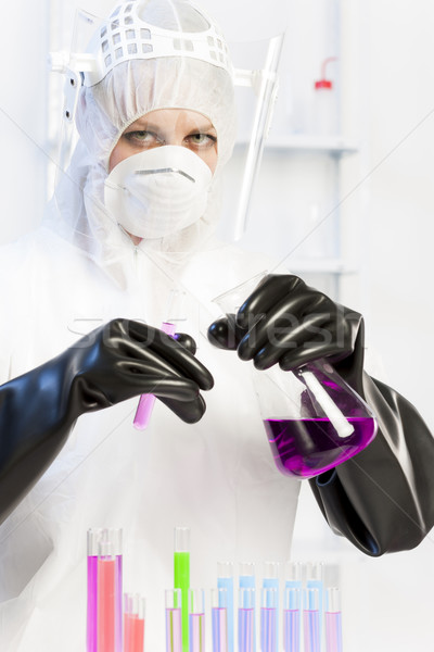 young woman wearing protective clothes in laboratory Stock photo © phbcz