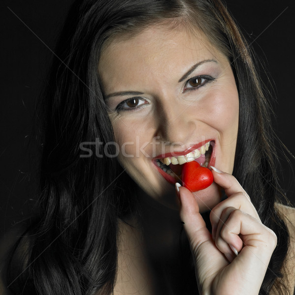 woman with a marchpane heart Stock photo © phbcz