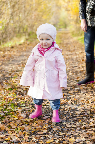 Kislány visel gumicsizma őszi természet lány Stock fotó © phbcz