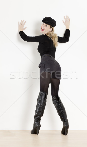 standing woman wearing fashionable boots Stock photo © phbcz
