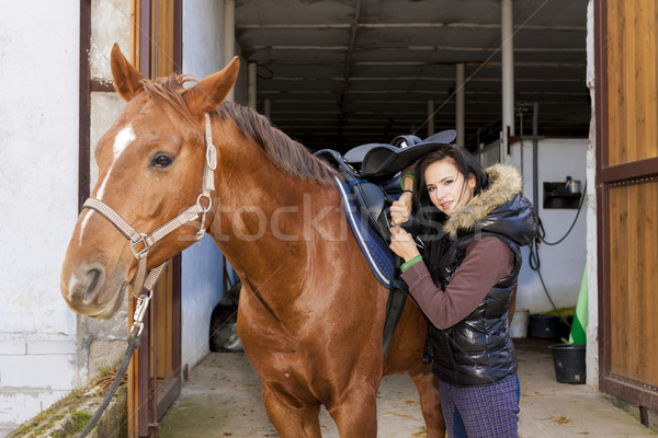 Stock photo: equestrian with her horse