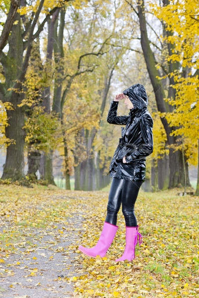 woman in autumnal alley Stock photo © phbcz