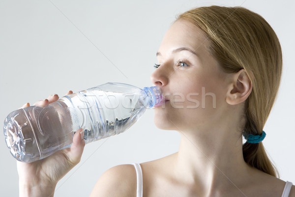 Retrato mujer botella agua jóvenes solo Foto stock © phbcz