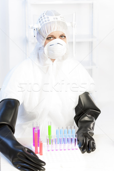young woman wearing protective clothes in laboratory Stock photo © phbcz