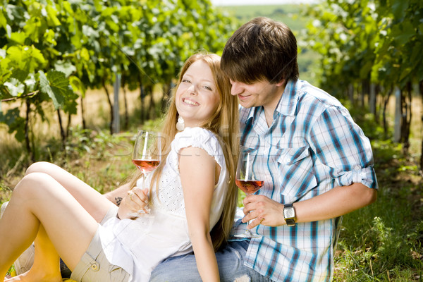 couple at a picnic in vineyard Stock photo © phbcz