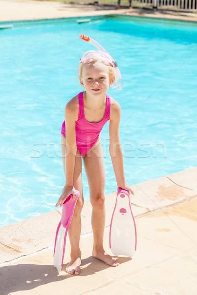 little girl with snorkeling equipment at swimming pool Stock photo © phbcz