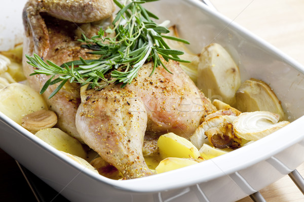 Stock photo: chicken baked with onion and potatoes