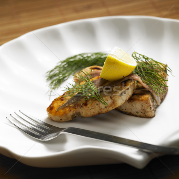 Stock photo: swordfish steak with anchovies