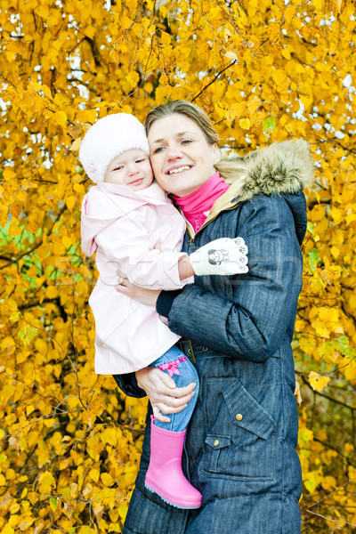 portrait of woman with toddler in autumnal nature Stock photo © phbcz