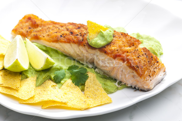 grilled salmon fillet with avocado sauce and nachos Stock photo © phbcz