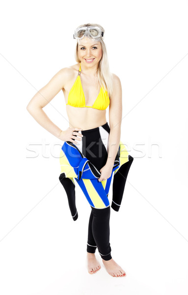 standing young woman wearing neoprene Stock photo © phbcz