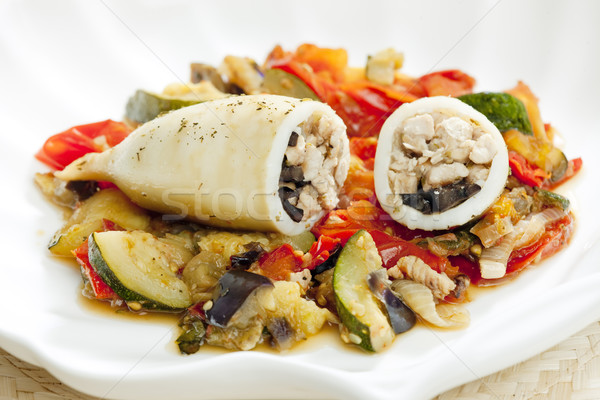 sepia filled with turkey meat on stew vegetables Stock photo © phbcz