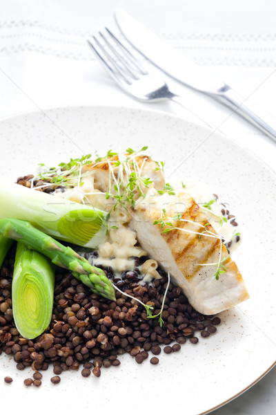 Stock photo: butterfish with green lentils, leek and green asparagus