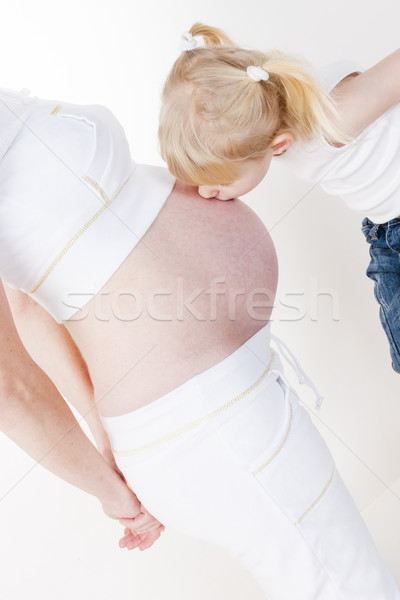 portrait of little girl with her pregnant mother Stock photo © phbcz
