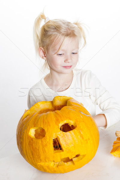 little girl carving pumpkin for Halloween Stock photo © phbcz