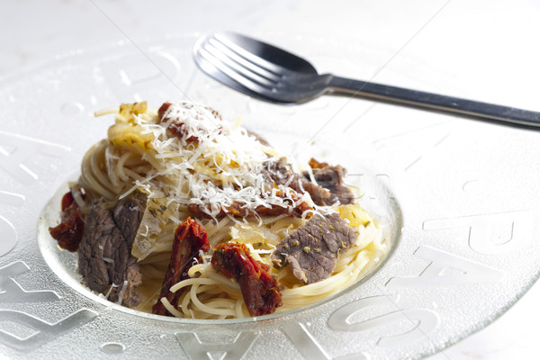 Spaghetti carne carne essiccati pomodori pomodoro Foto d'archivio © phbcz