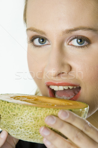 portrait of woman with melon cantaloupe Stock photo © phbcz