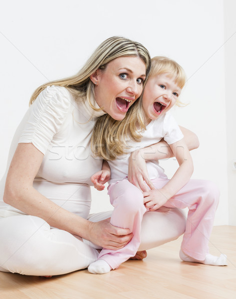 little girl with her pregnant mother Stock photo © phbcz