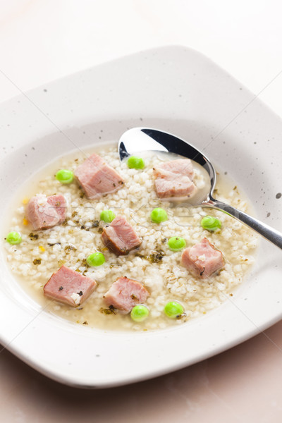 smoked meat bouillon with pearl barley and peas Stock photo © phbcz