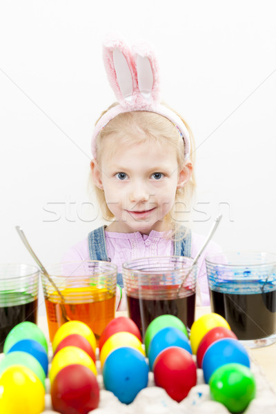 portrait of little girl during Easter eggs'' coloration Stock photo © phbcz