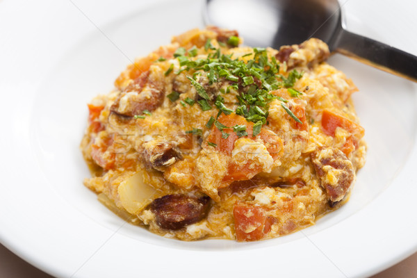meal called leco (mixture of vegetables and eggs with sausage) Stock photo © phbcz