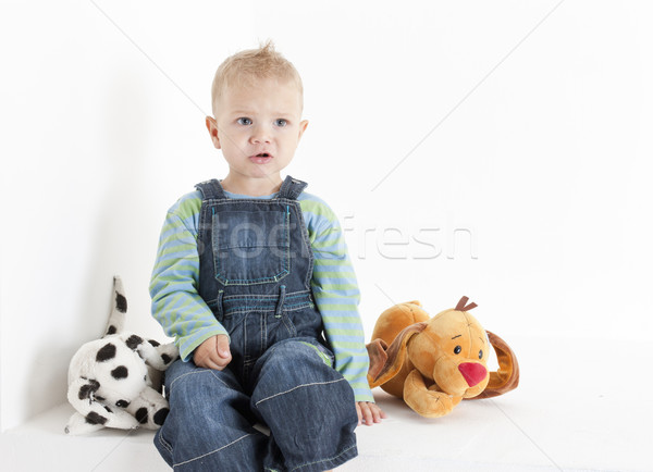 sitting toddler with toys Stock photo © phbcz