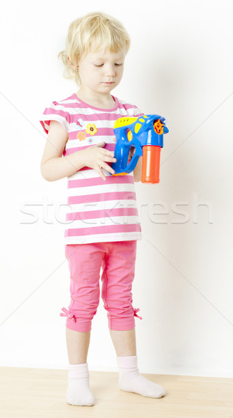 little girl with bubbles maker Stock photo © phbcz
