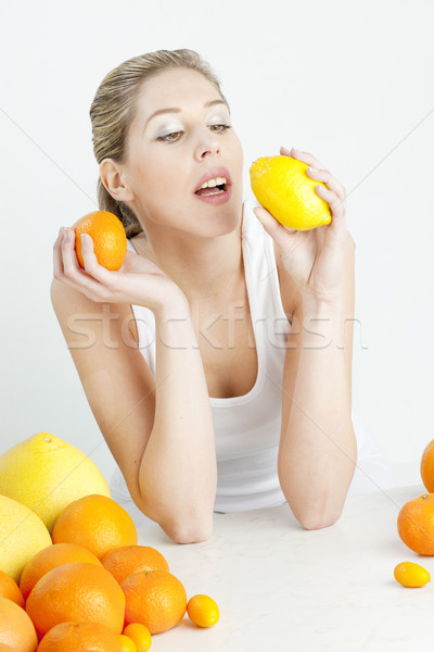 Portré fiatal nő citrus gyümölcs étel nők fiatal Stock fotó © phbcz